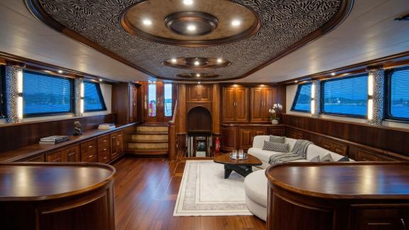 In Marmaris gulet charter option Tosca salon with large seating area and elegant design offering comfortable onboard liv