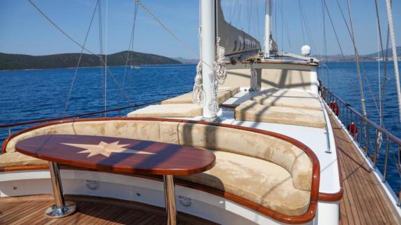 Cozy seating area on the luxurious Gulet Uluçınar in Bodrum, Turkey.