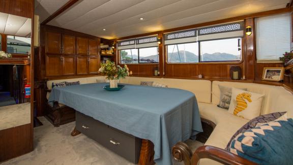 Saloon of the Viago Nella Speranza gulet in Marmaris, offering a comfortable social space during yacht charter holidays.