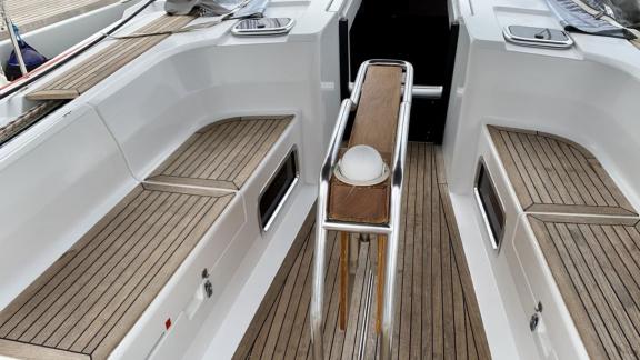 The cockpit of Baxter sailing yacht features an elegant seating area, offering comfort and modern design.