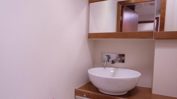 Elegant and modern sink area in the bathroom of the Fox yacht.