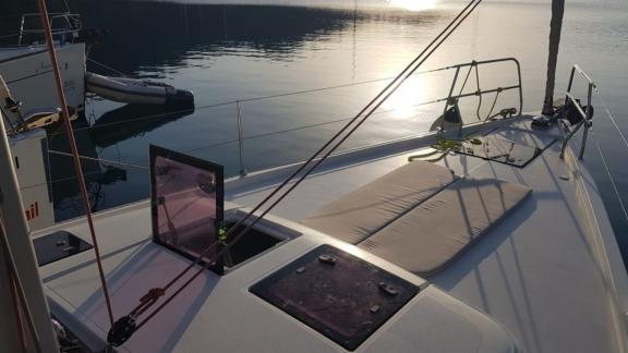 The deck of the Fox sailing yacht features a comfortable sunbathing area with a sea view.