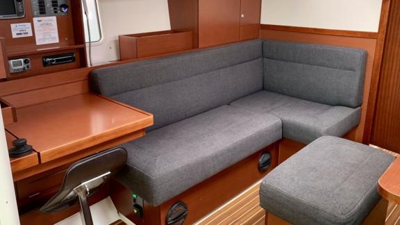 The salon of Taurus 6 yacht features a cozy seating area.