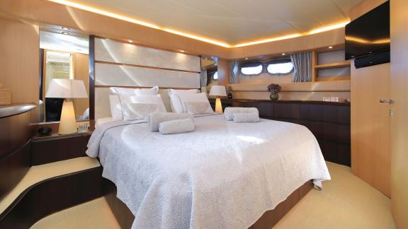 Image of the elegant and comfortable master bedroom on Hope I yacht.