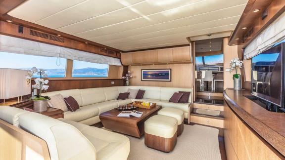 Image of the luxurious salon of Hope I yacht with a spacious and comfortable seating area.