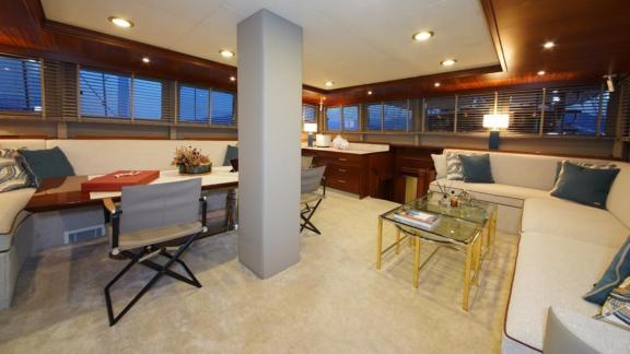 Cozy living room with modern furniture and elegant lighting on a yacht