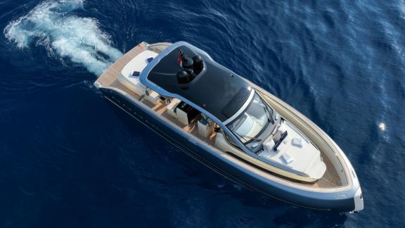 Among Monaco yacht rental options Baccarat motor yacht is seen from above cruising fast on open sea.