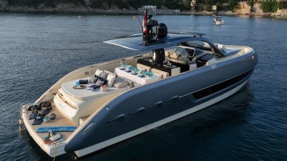 Among Monaco yacht rental options Baccarat motor yacht shows aft deck with seating and service area.