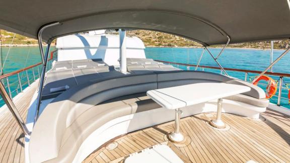 Luxurious sun deck with loungers and sea view on Gulet K. Salih Ünlü.