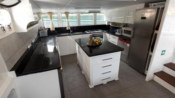 Fully equipped, modern kitchen on the Gulet Kayhan 11 in Fethiye, perfect for culinary experiences.