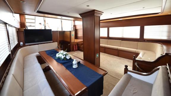 Stylish and comfortable saloon area on the Gulet Kayhan 11 in Fethiye, perfect for relaxation.