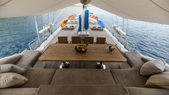 The comfortable deck of the Gulet Kayhan 3 invites you to relax with cosy seating and loungers.