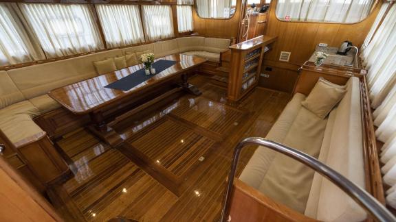 The elegant saloon of the Gulet Kayhan 5 offers a comfortable and stylish lounge area.