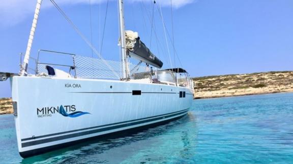 The sailing yacht Kia Ora is anchored in the calm and clear waters of Marmaris, ideal for a sailing holiday.