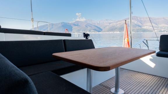 The open seating area on Lyubushka offers relaxing yacht charter and blue cruise moments in Montenegro.