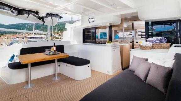 Lagoon 46 Madame El Grande features a spacious aft deck area with comfortable seating at Kastela Marina.