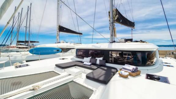 Lagoon 46 Madame El Grande offers a spacious foredeck area for relaxing during catamaran charter holidays from Kastela.