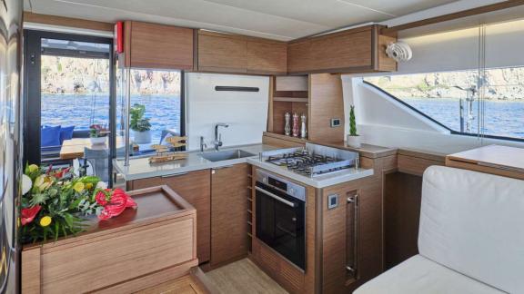 The catamaran Andare Avanti offers a full kitchen and sea views while sailing Athens.