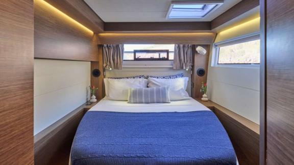 The catamaran Andare Avanti offers a bright double cabin for restful nights near Athens.
