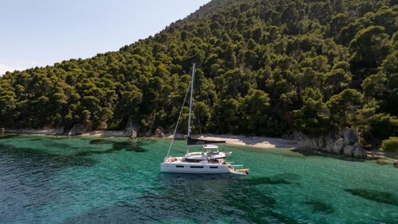 Aranel is anchored in a turquoise cove in Lefkada. She features 6 cabins and hosts up to 10 guests.