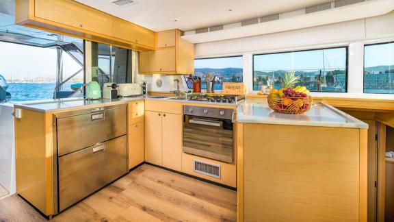 Largo Winch features a fully equipped modern galley, adding comfort to your catamaran charter in Mykonos.