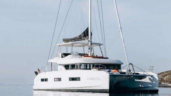 Aurelia is a modern catamaran anchored in the waters of Athens. With its spacious deck and elegant design it offers both