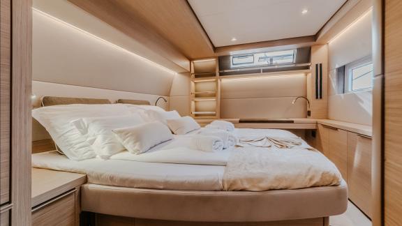 Among catamaran rental options Triwing Ossus double cabin bed detail offers a comfortable onboard stay.