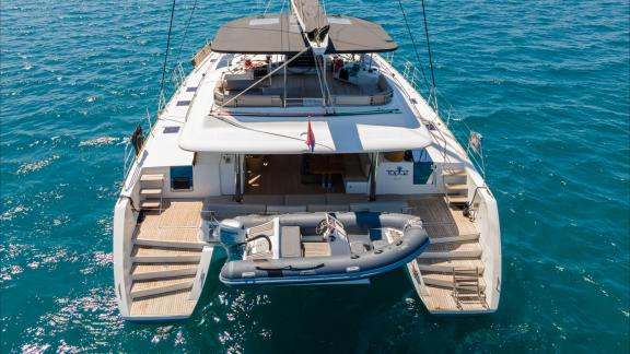 Topaz features a spacious aft deck with lounging area, stair access, and a dedicated tender platform.