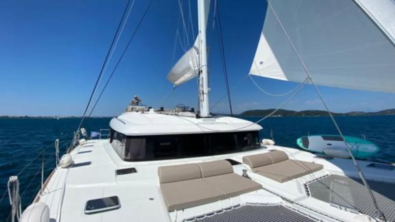 Grace Lagoon 620 catamaran sails with wide deck space in open waters.