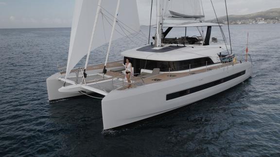 Lagoon Sixty 5 catamaran TriWing Endor offers a perfect sailing day near Kastela’s calm shores.