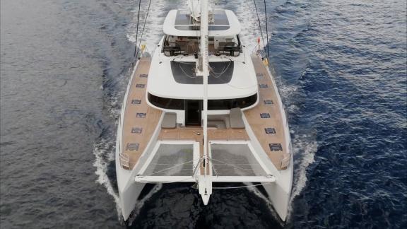 Lagoon Sixty 5 impresses with sleek design and spacious deck while sailing offshore.