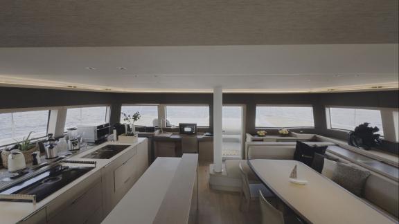 TriWing Endor’s bright saloon offers sea views, while the galley comes with top-tier kitchen equipment.