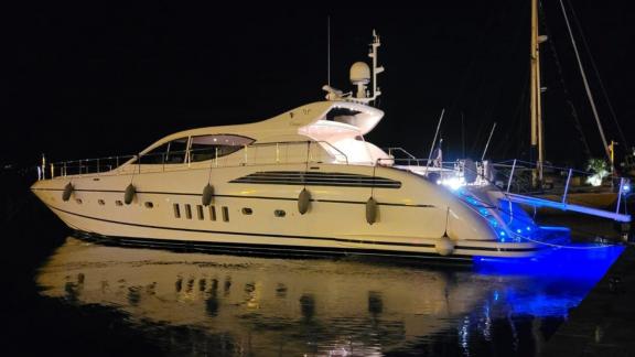 Among Cannes yacht charter options Cristal 1 motor yacht shows illuminated hull and calm night cruising.