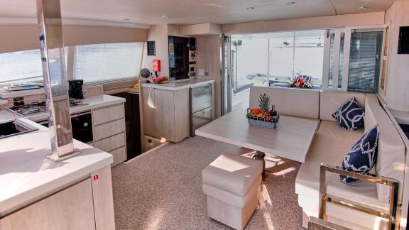 The saloon of catamaran Derya features stylish furniture and a spacious seating area.