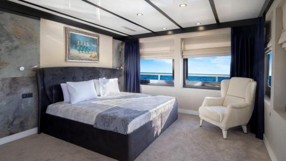 A luxurious cabin on the 52-meter motor yacht Limitless, offering utmost comfort and breathtaking views in Bodrum.