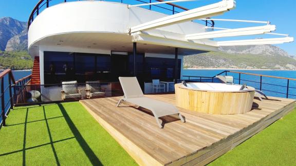 Relax in the private jacuzzi area of the 52-meter motor yacht Limitless, perfect for leisurely hours in Bodrum.