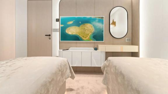 In Split motorsailer charter option Maxita cabin with beds and vanity desk visible.