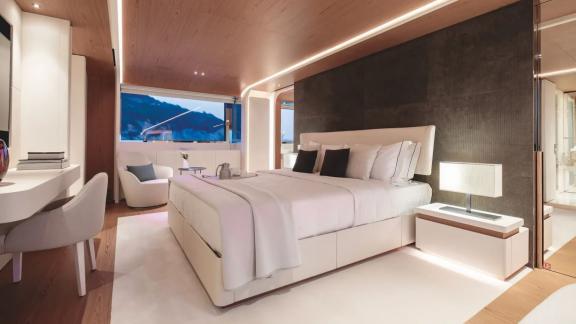 Spacious master cabin with elegant design and sea views aboard Dawo motor yacht in Sibenik.