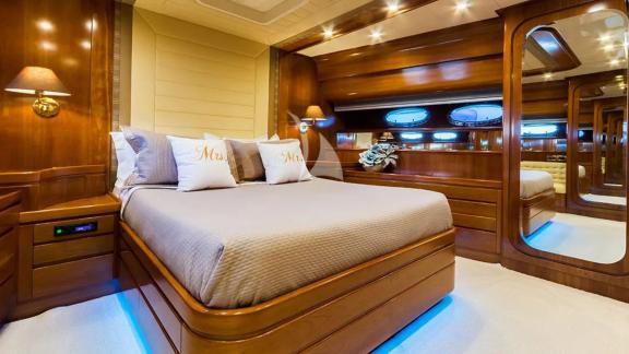 The spacious double cabin of yacht Amoraki is elegantly decorated.