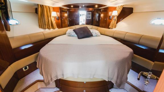 The bedroom of motor yacht Unplugged provides a comfortable stay.