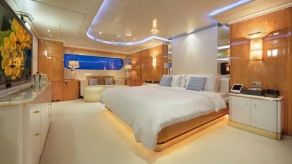 The spacious master suite on Code 8 yacht makes your Dubai yacht rental experience unforgettable.