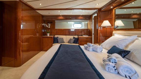 Available for charter in Athens the 4 cabin 10 guest Falcon 86 Estia Poseidon motor yacht offers a cozy VIP cabin with w