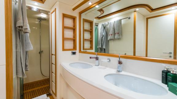 Spacious and modern bathroom with Italy luxury yacht charter.