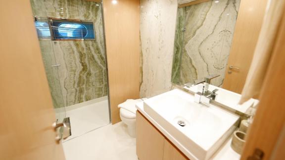 The modern and stylish bathroom on Princess Melda yacht features a spacious shower area.