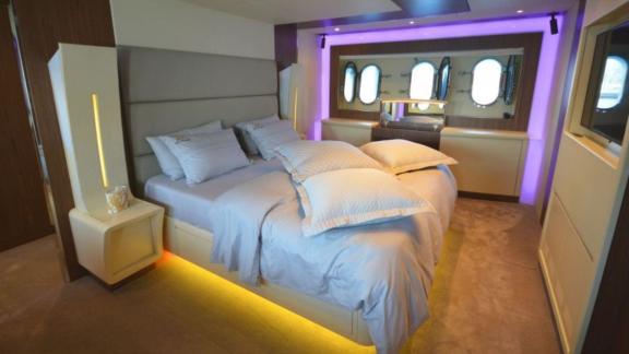 Cozy and stylish cabin with modern amenities on a motor yacht.