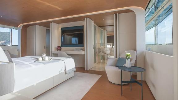 Lounge area, vanity desk and sea-facing windows in the master suite aboard Dawo yacht in Sibenik.