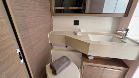 Zalina’s compact bathroom combines style and function.