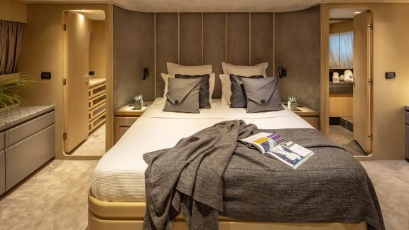 Enjoy a restful night in the elegant bedroom of Motor Yacht Summer Fun with a king-size bed.