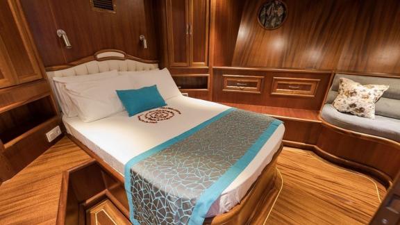 Comfortable cabin with double bed on the 6-cabin gulet Koray Ege, for hire in Marmaris.