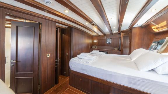 Spacious cabin of the gulet yacht Jasemin 1 with comfortable double bed.